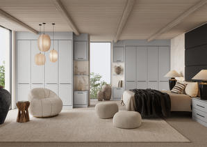 dove grey bedroom with hanging lights and a grey sofa chair