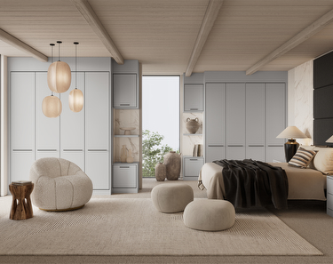 dove grey bedroom with hanging lights and a grey sofa chair